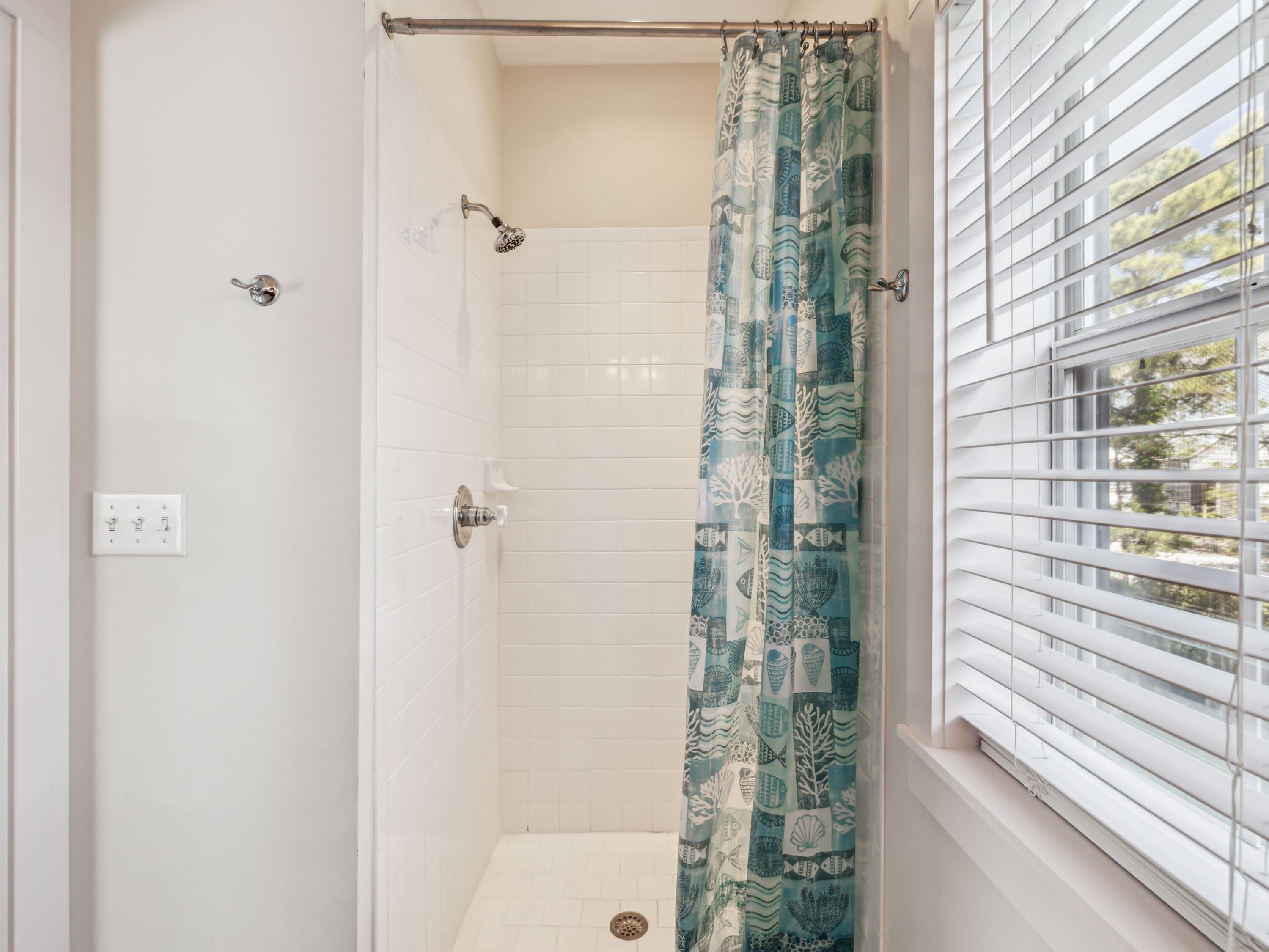 198 Somerset Bridge Road, Unit 103 Santa Rosa Beach, FL 32459 - Photo 29 of 39 a bathroom with a shower
