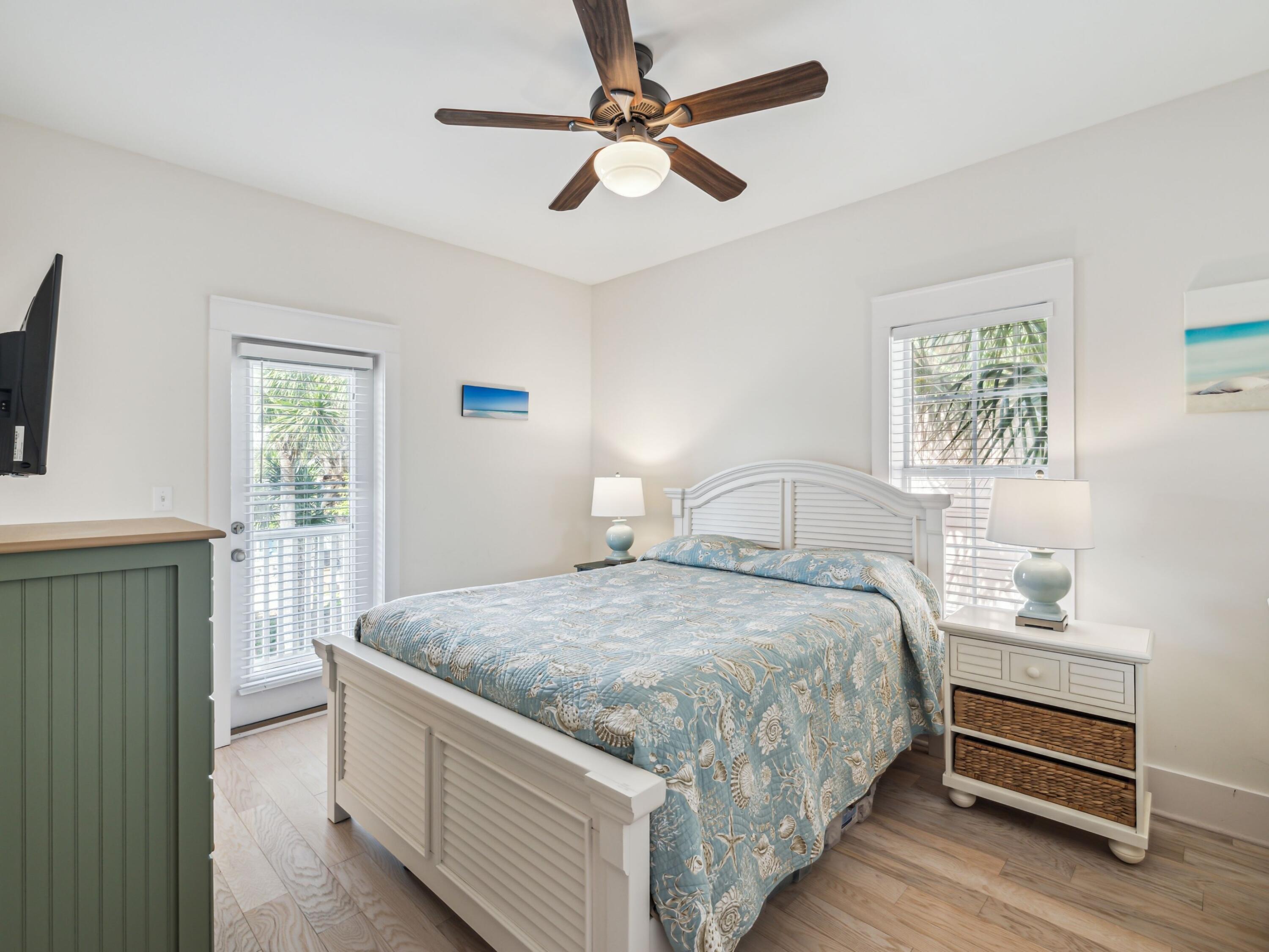 198 Somerset Bridge Road, Unit 103 Santa Rosa Beach, FL 32459 - Photo 5 of 39 a bedroom with a bed dresser and a window