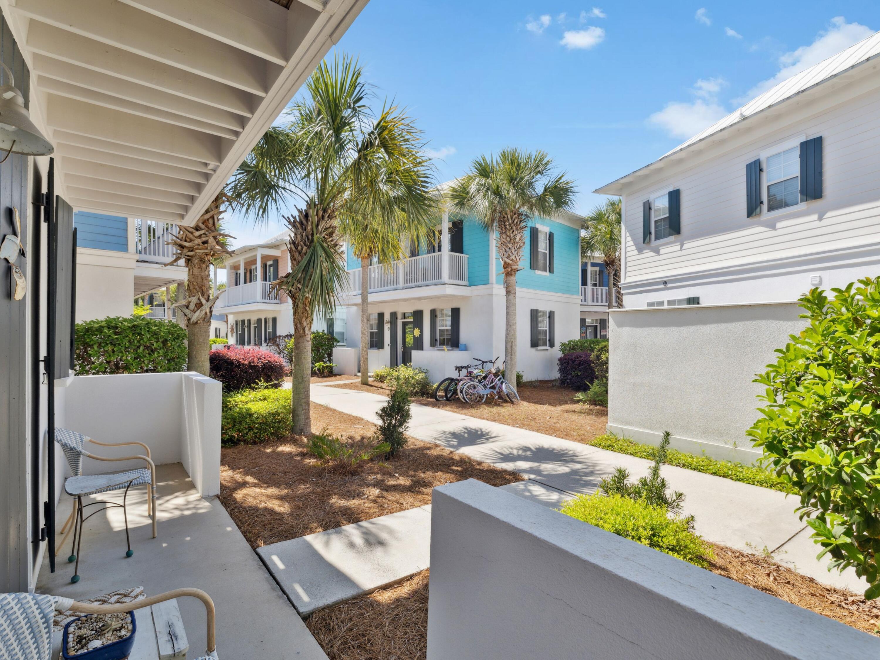 198 Somerset Bridge Road, Unit 103 Santa Rosa Beach, FL 32459 - Photo 10 of 39 a front view of a house with garden
