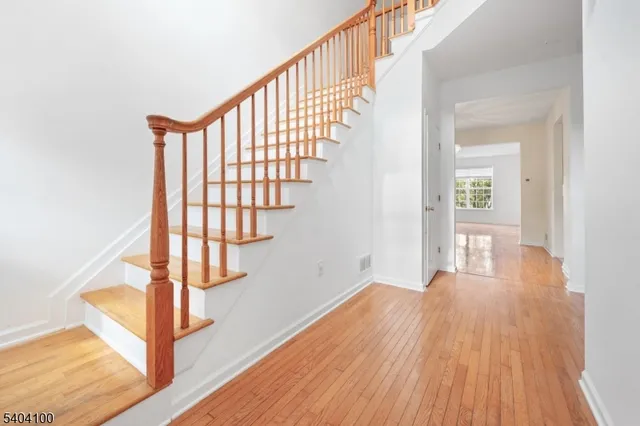 a view of entryway with wooden floor