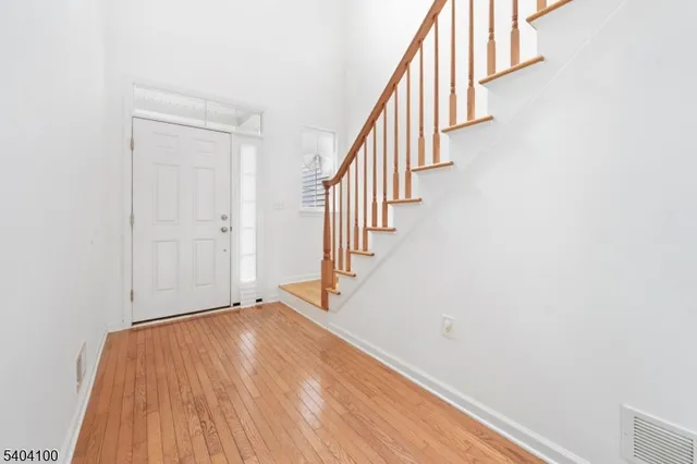 a view of a kitchen with a sink and a window