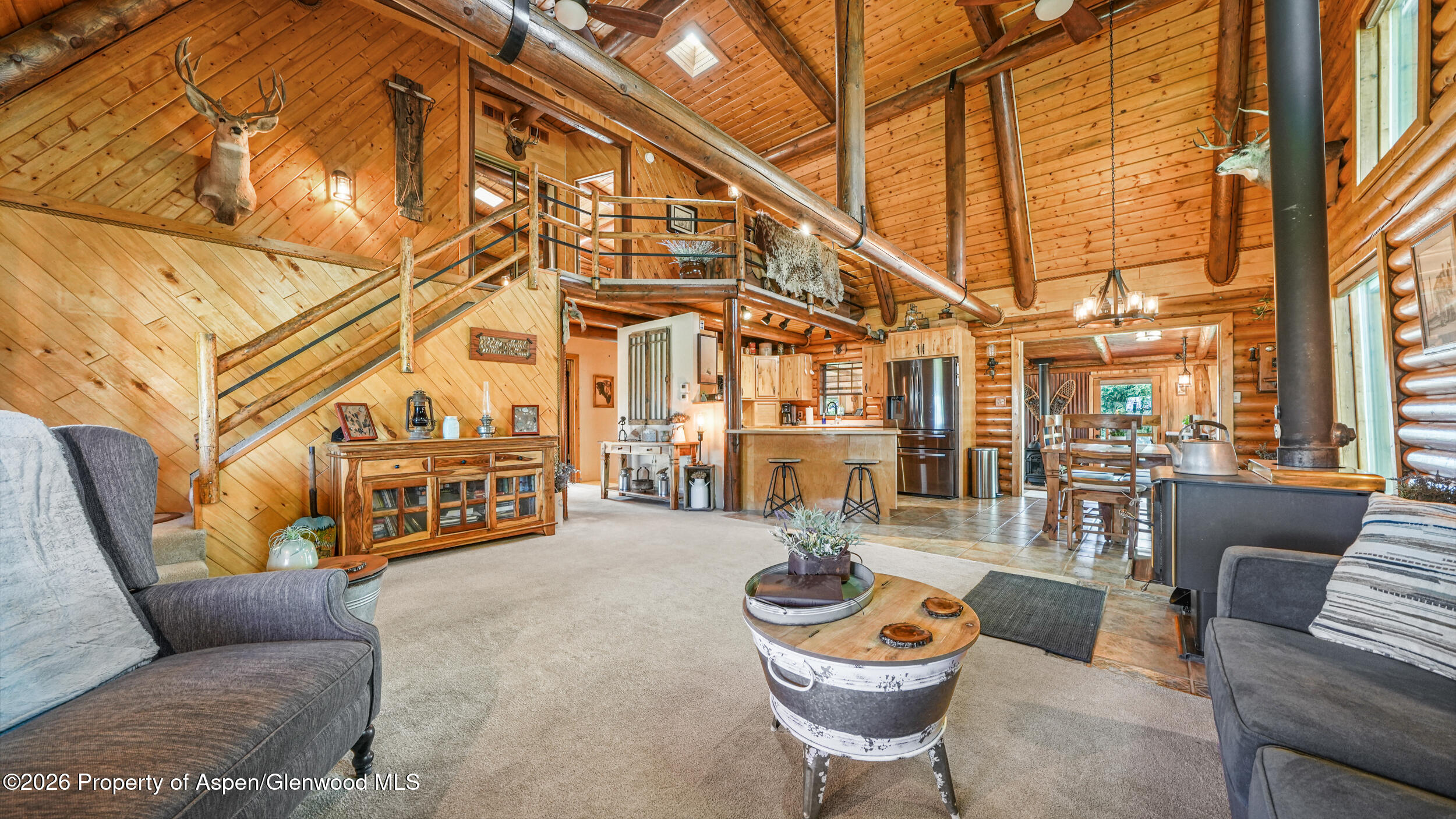 1355 N Road Loma, CO 81524 - Photo 13 of 51 a building outdoor space with patio furniture and a potted plant