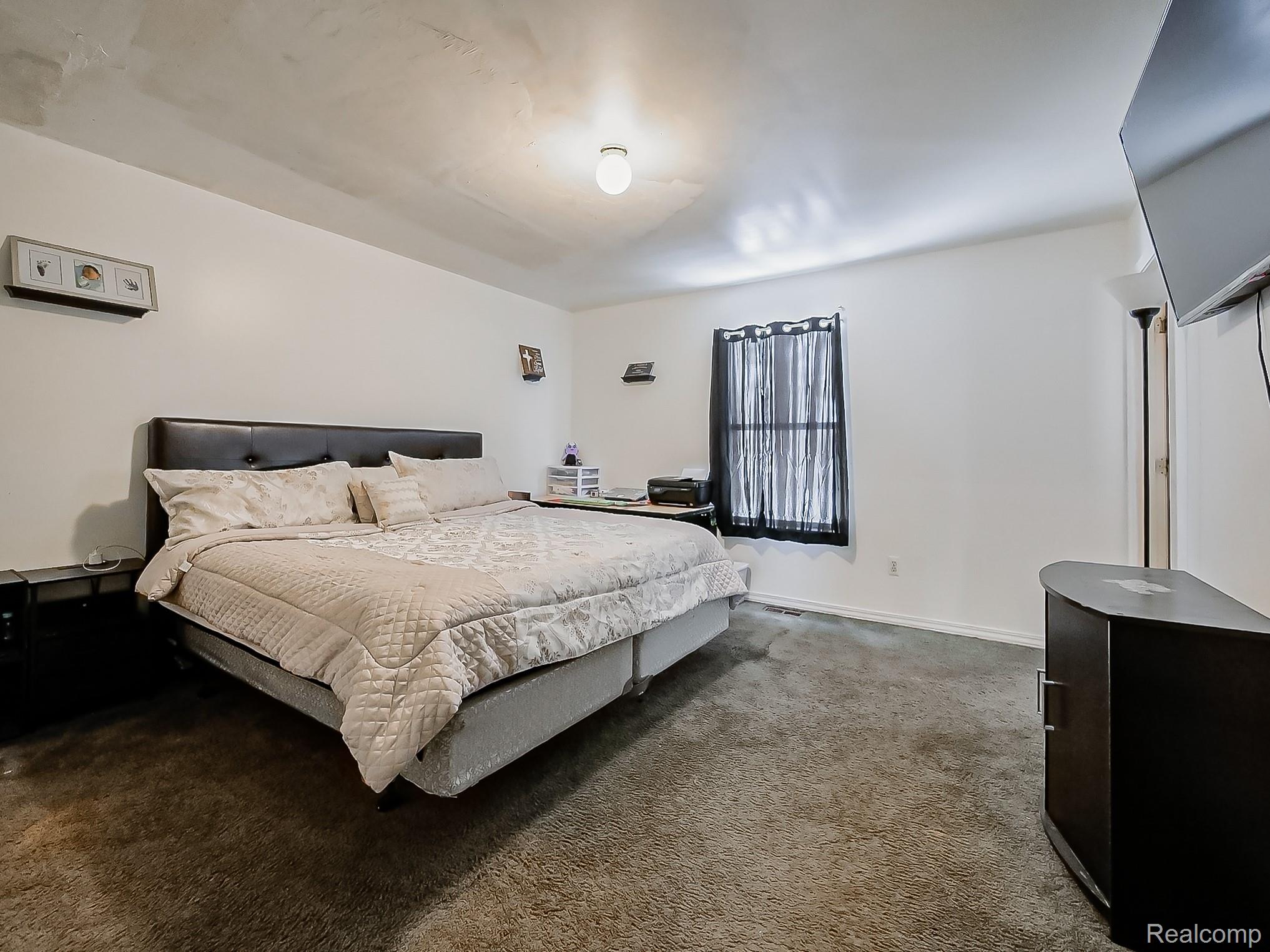 34460 Van Born Road Wayne, MI 48184 - Photo 13 of 31 Carpeted bedroom with baseboards