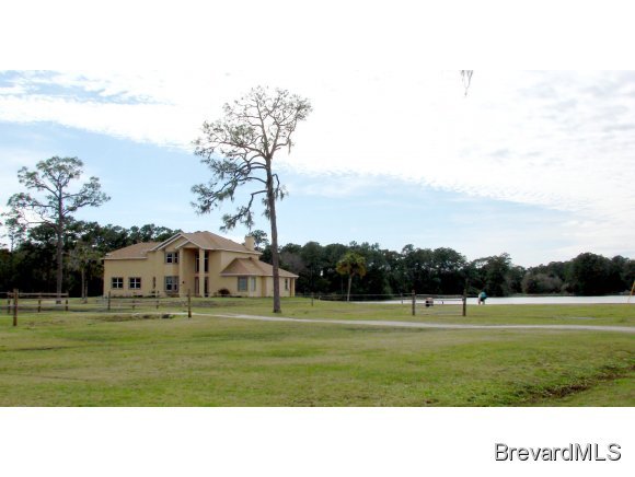 6411 Sorrel Drive, Unit STABLE Cocoa, FL 32926 - Photo 1 of 12 a black and white photo of a park
