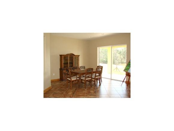 6411 Sorrel Drive, Unit STABLE Cocoa, FL 32926 - Photo 7 of 12 a picture of a living room with furniture
