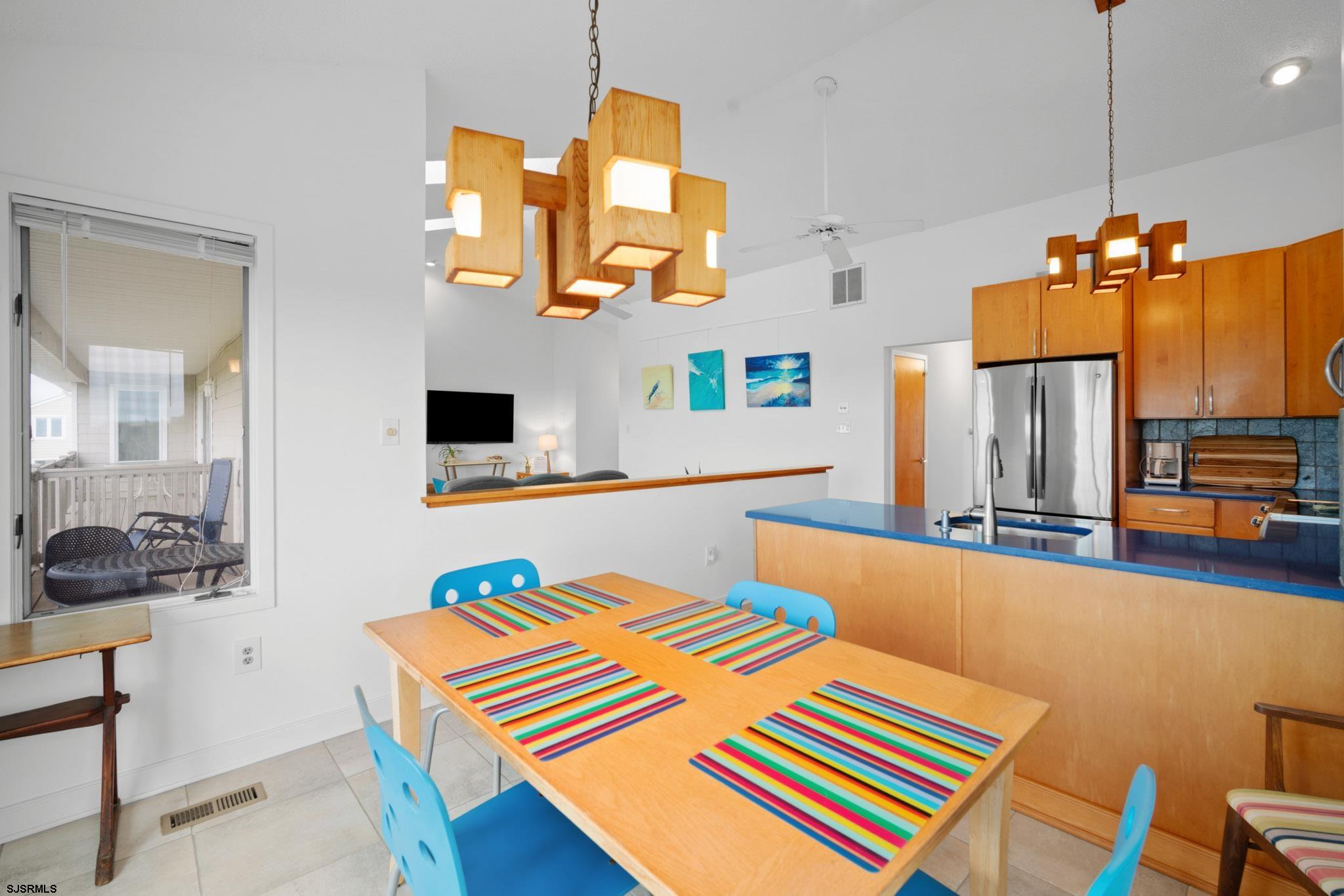 45 Coquille, Unit 45 Brigantine, NJ 08203 - Photo 12 of 30 a bedroom with a bed and flat screen tv