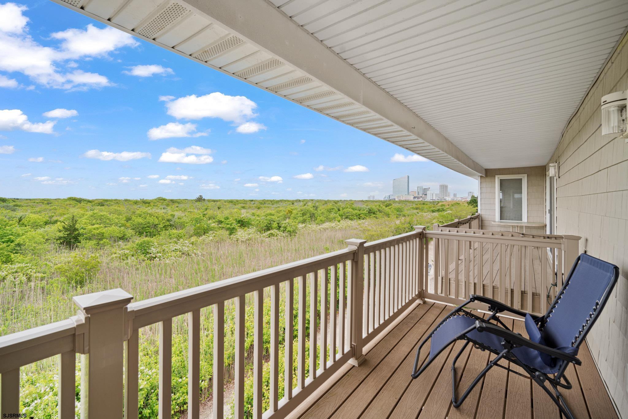 45 Coquille, Unit 45 Brigantine, NJ 08203 - Photo 10 of 30 a view of a two chair in the balcony