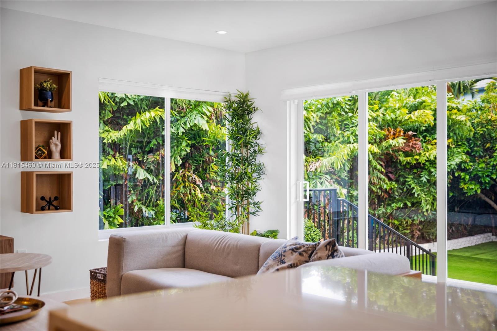 38 Southwest 25th Road Miami, FL 33129 - Photo 12 of 29 a living room with furniture and a window
