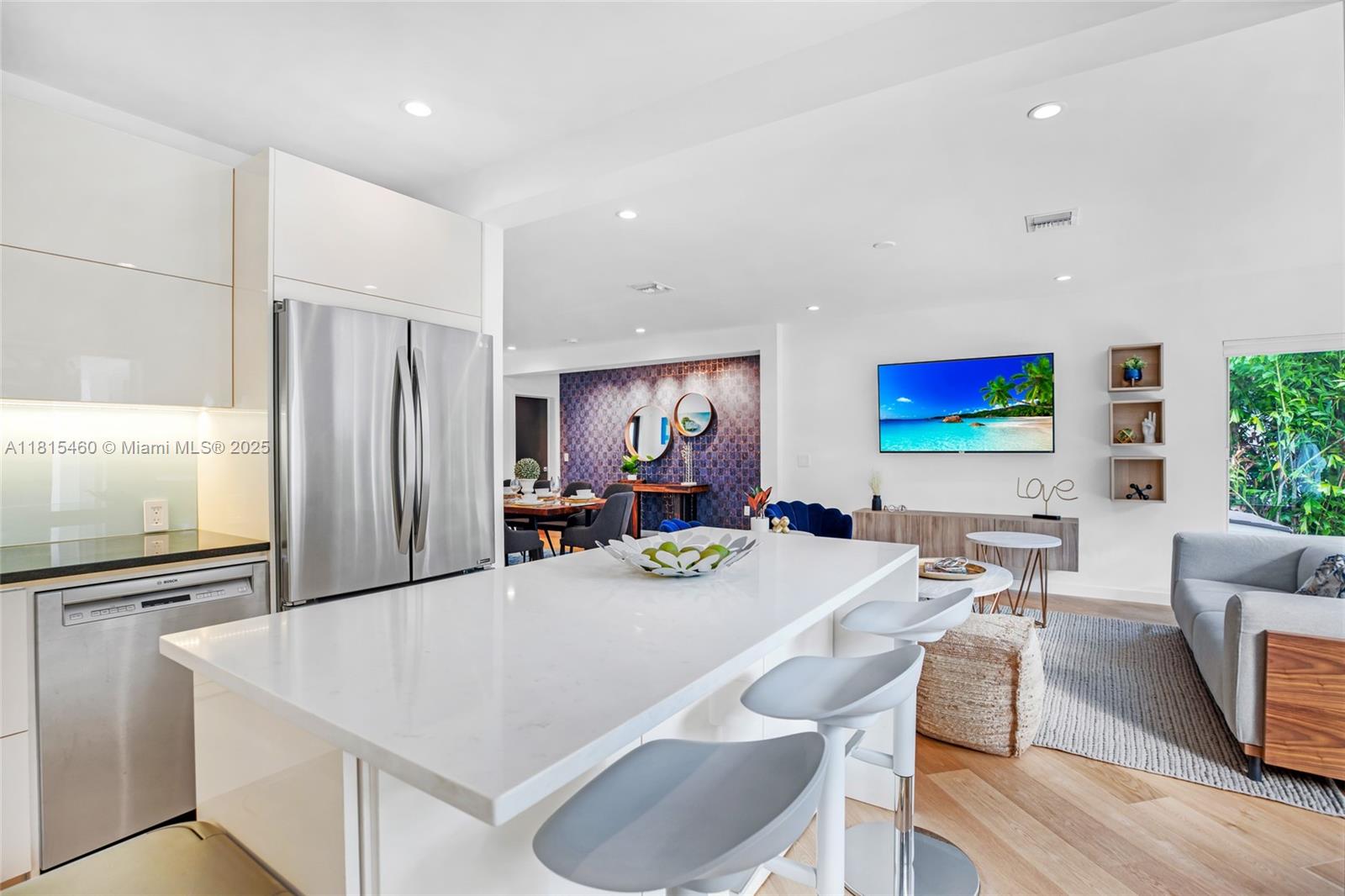 38 Southwest 25th Road Miami, FL 33129 - Photo 15 of 29 a view of a dining room with furniture window and wooden floor