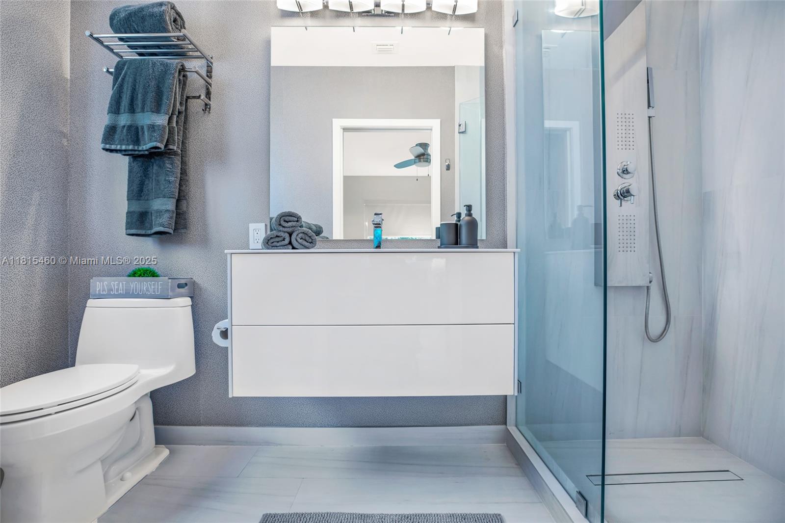 38 Southwest 25th Road Miami, FL 33129 - Photo 24 of 29 a bathroom with a shower and a toilet