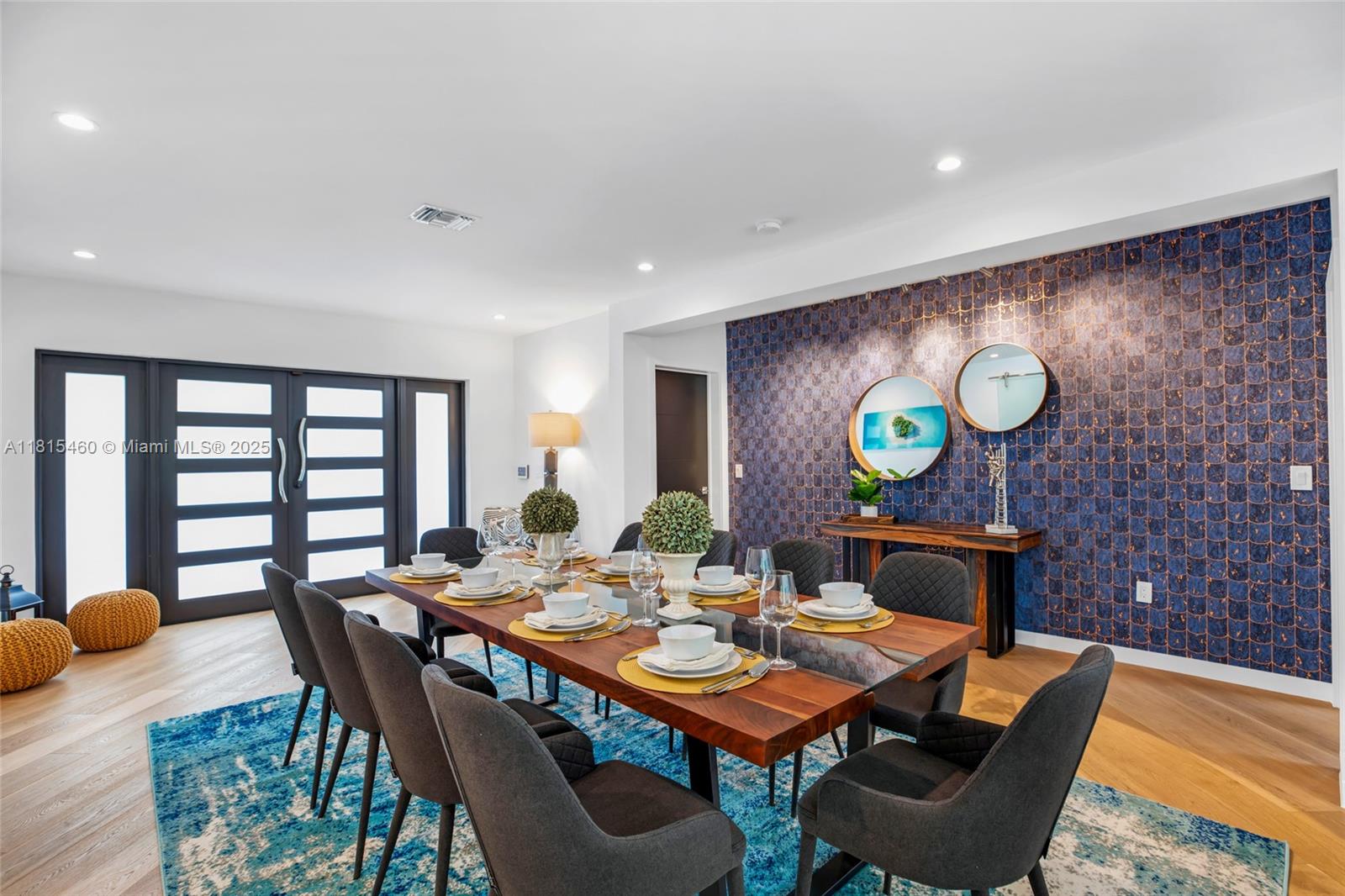 38 Southwest 25th Road Miami, FL 33129 - Photo 6 of 29 a dining room with furniture and wooden floor