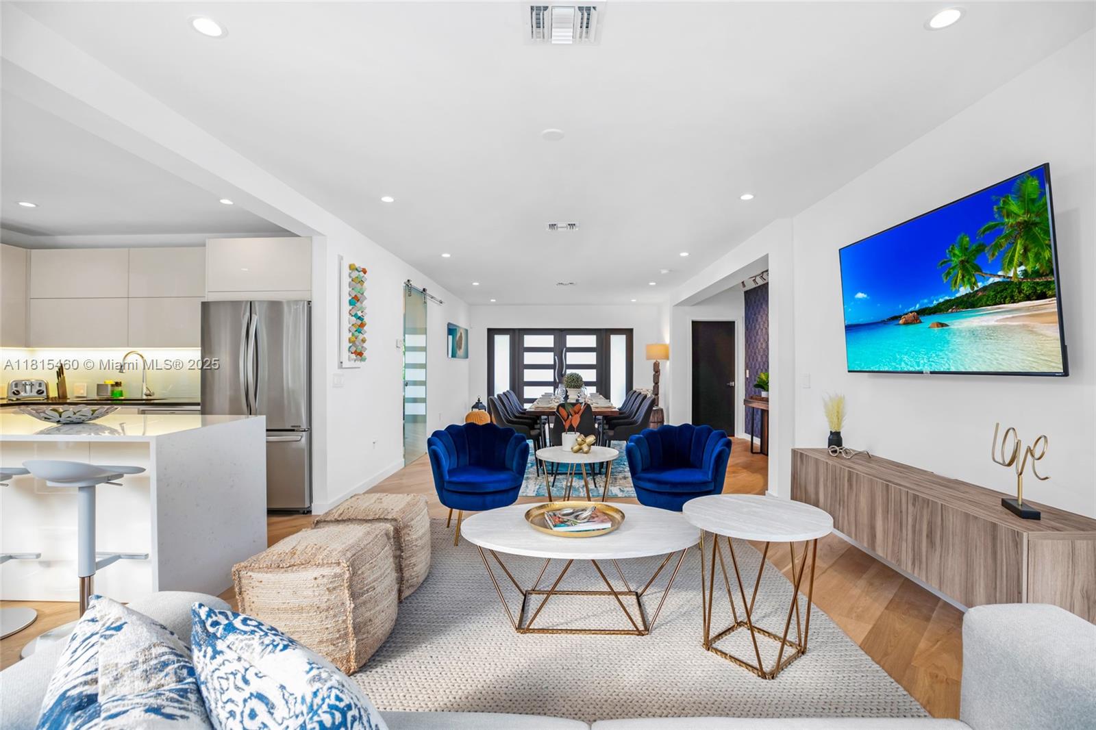 38 Southwest 25th Road Miami, FL 33129 - Photo 9 of 29 a living room with furniture dining table and a couch