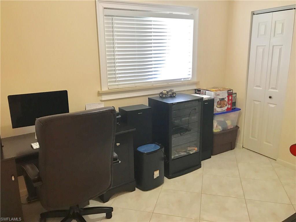 4256 31st Place Southwest Naples, FL 34116 - Photo 17 of 20 a bathroom with a toilet