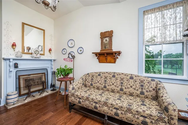 a living room with a couch and a fireplace