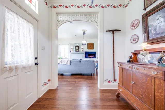 a view of a kitchen cabinets and wooden floor