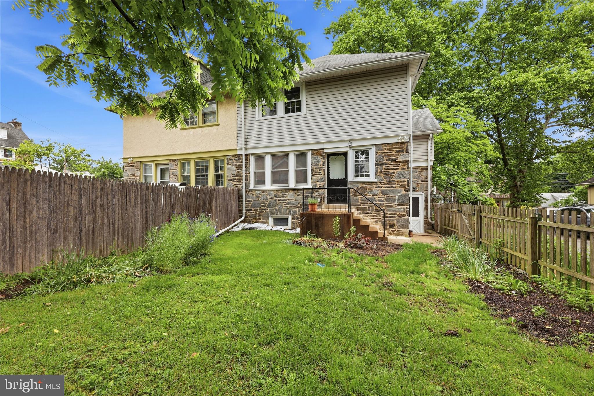 7208 Hilltop Road Upper Darby, PA 19082 - Photo 28 of 28 a view of a house with backyard and sitting area