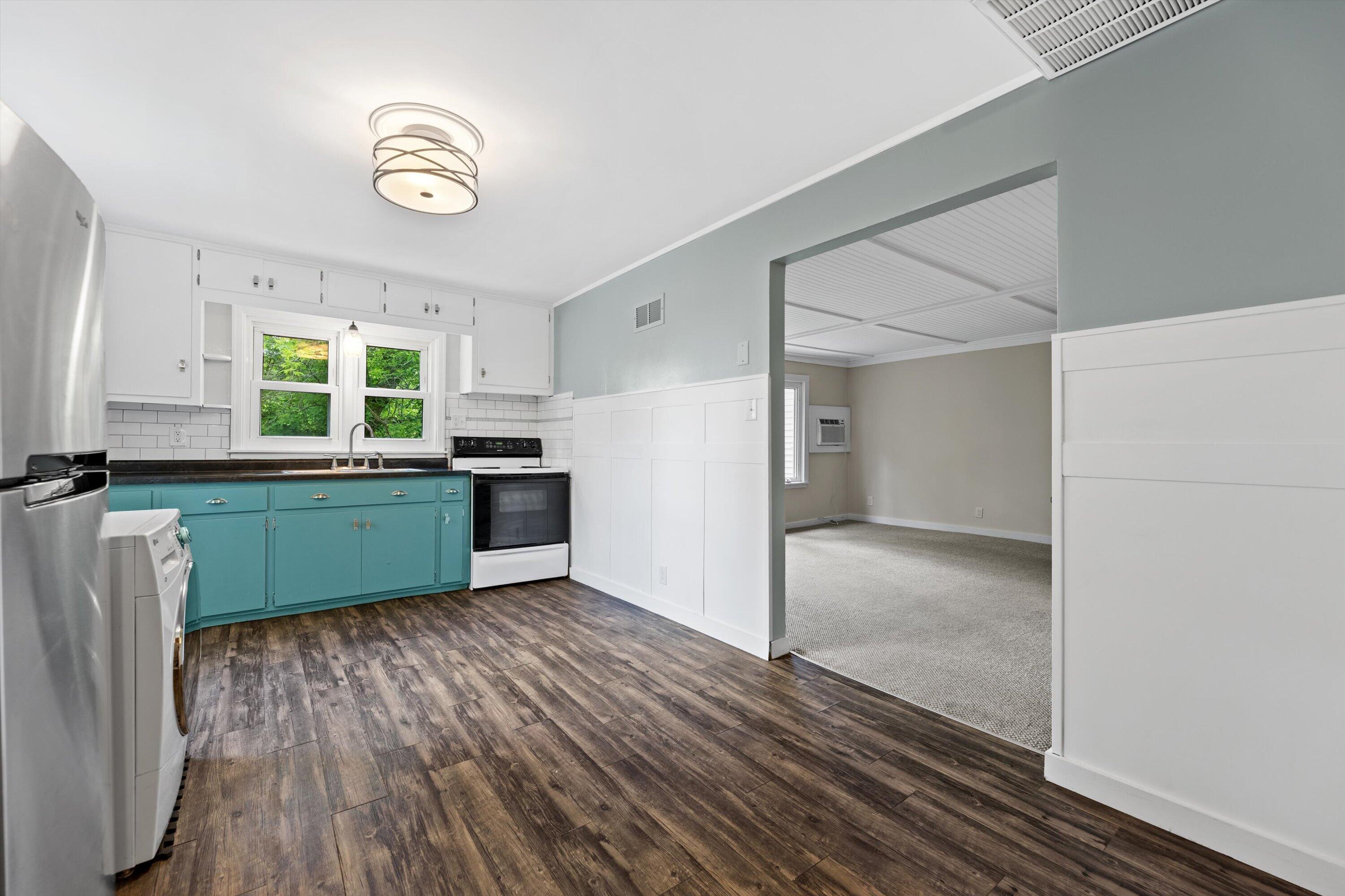 N132W18286 Rockfield Road Germantown, WI 53076 - Photo 27 of 56 Upper North Kitchen & Utility with BR Ac
