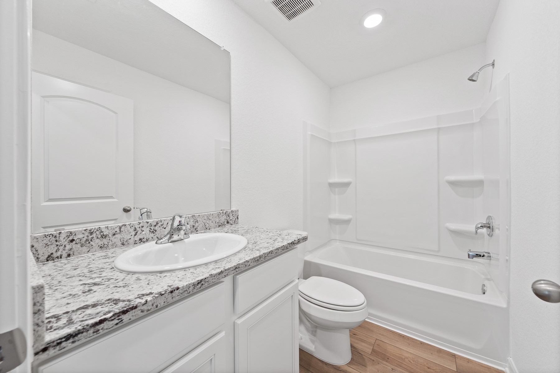 189 Fairlawn Way Maxwell, TX 78656 - Photo 10 of 10 Full bathroom featuring vanity, shower / washtub combination, light wood finished floors, and recessed lighting