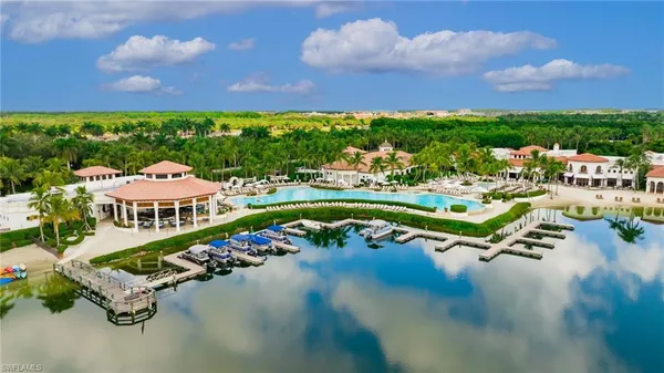 an aerial view of a swimming pool patio swimming pool and outdoor seating