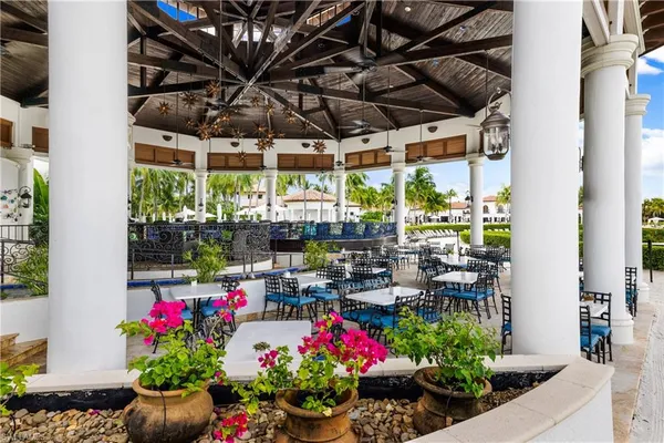 a view of a patio with swimming pool