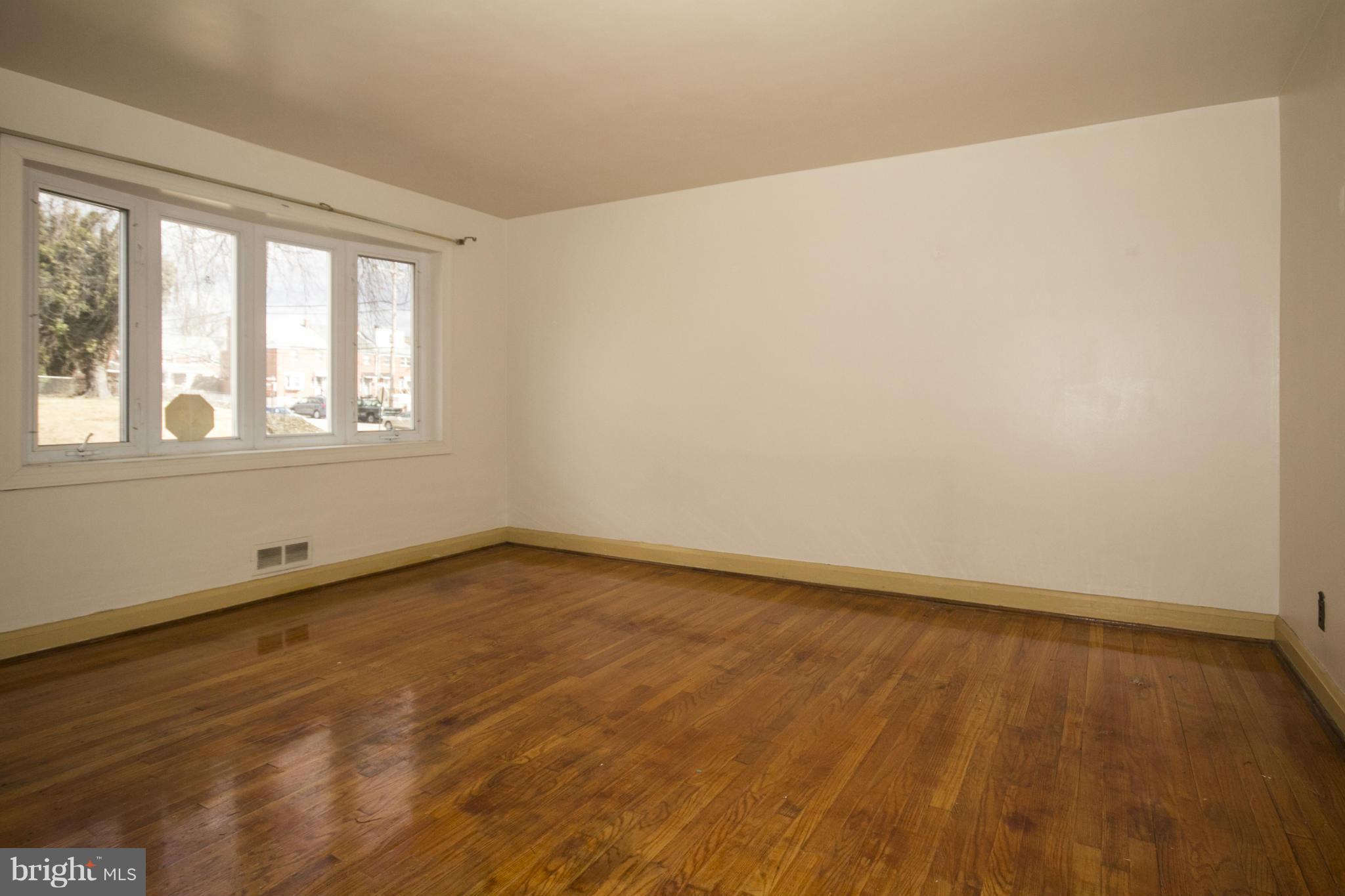 1673 Northbourne Road Baltimore, MD 21239 - Photo 3 of 21 an empty room with a window