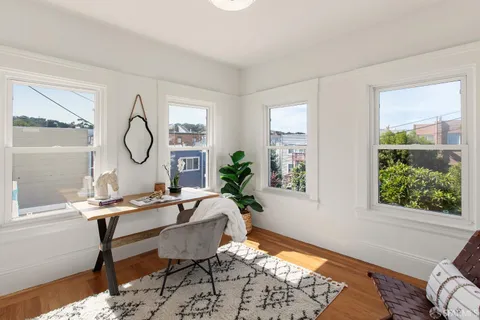 a room with furniture and a window