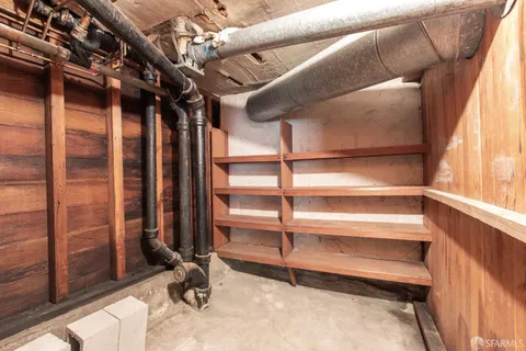 a view of a garden with an outdoor seating