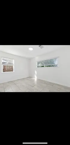 a view of an outdoor space and a floor to ceiling window