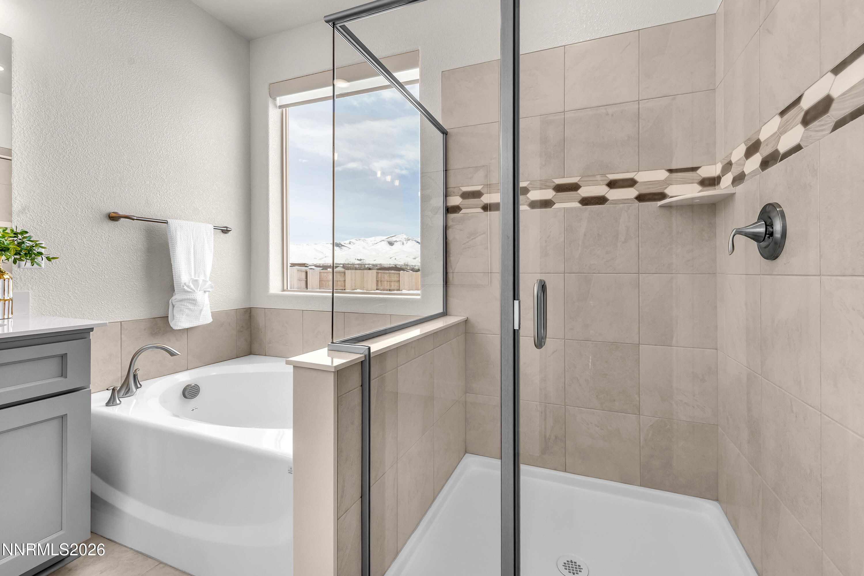 815 North Thunder Butte Court Reno, NV 89506 - Photo 18 of 35 a bathroom with a bathtub and shower