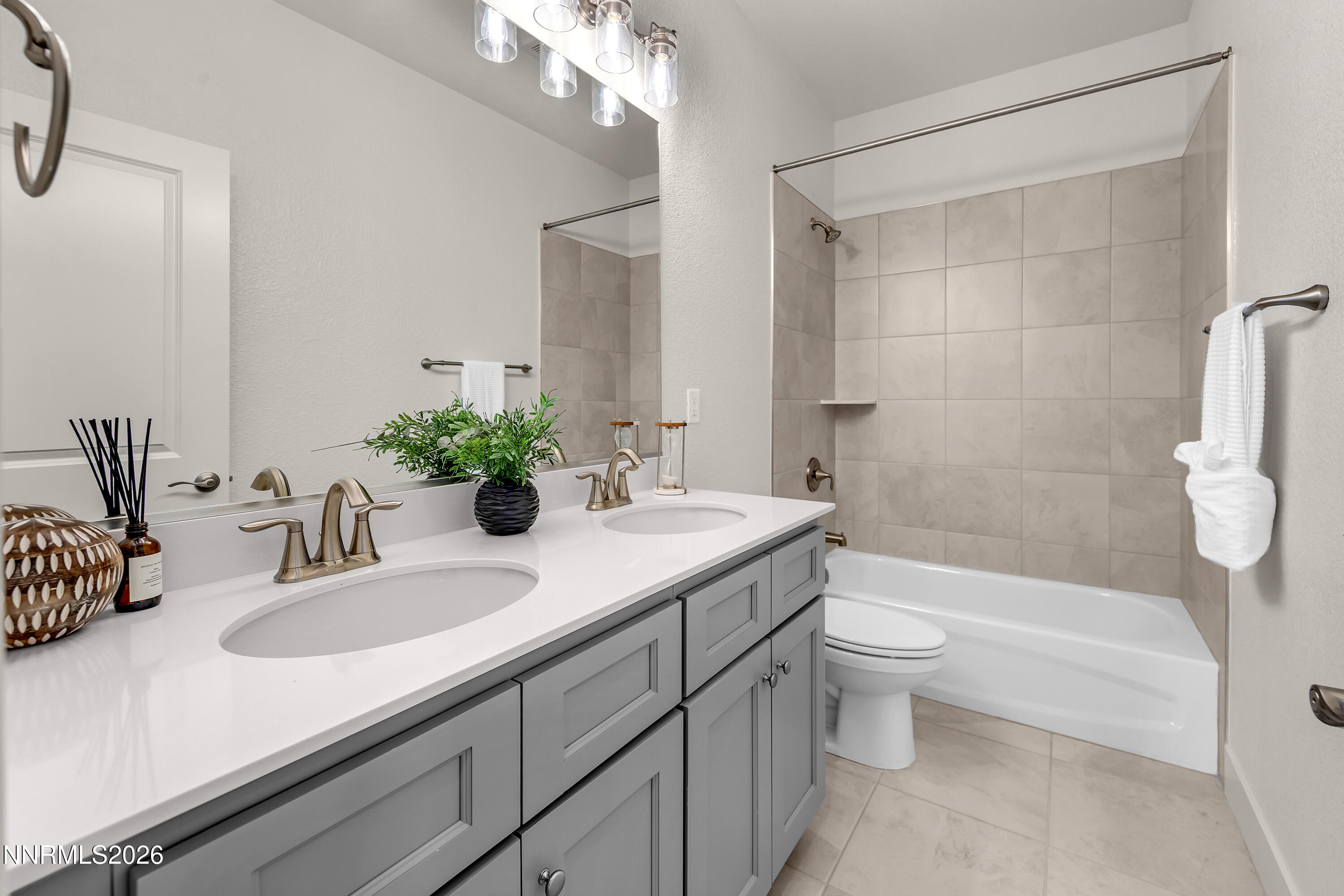 815 North Thunder Butte Court Reno, NV 89506 - Photo 19 of 35 a bathroom with a sink a toilet and shower