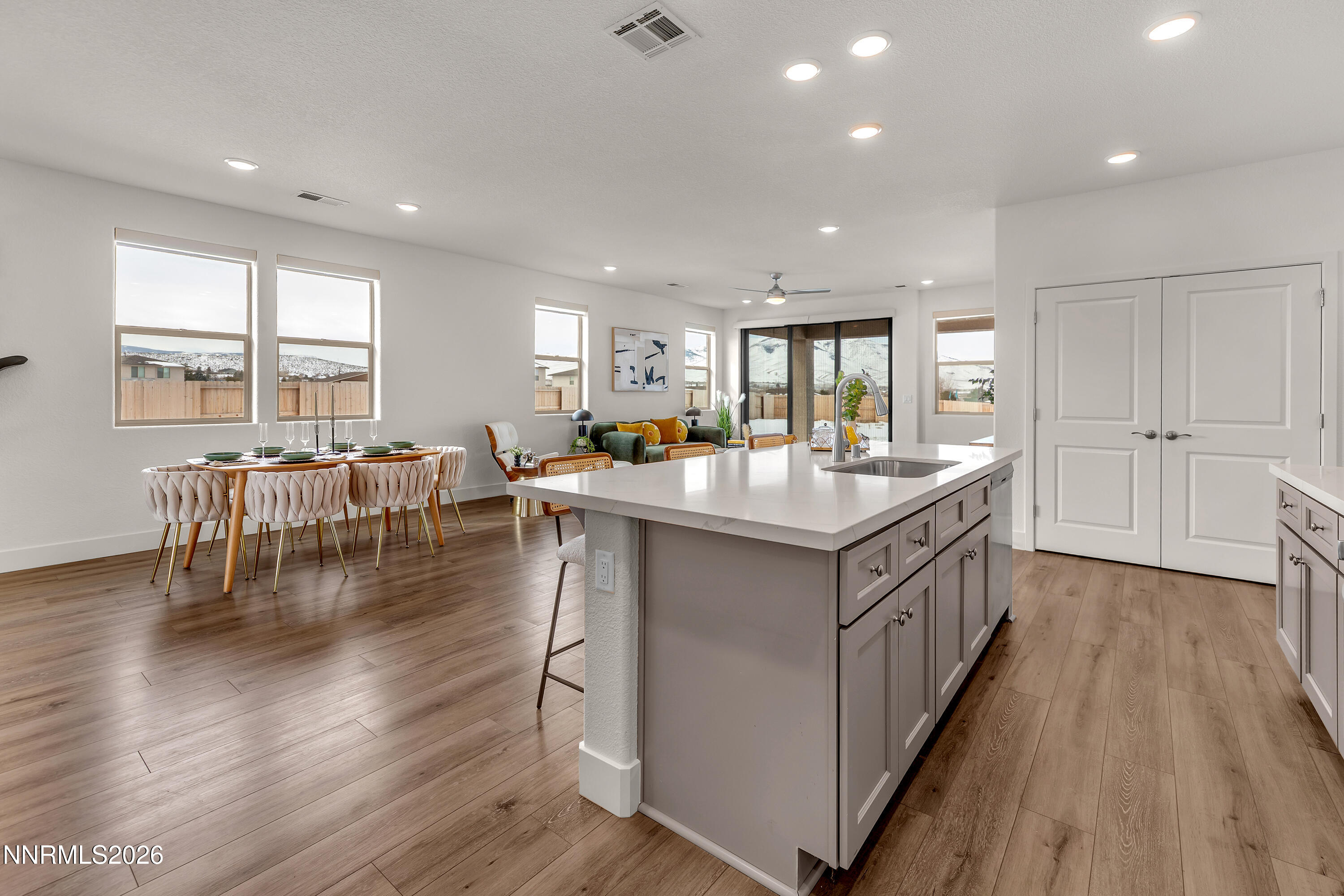815 North Thunder Butte Court Reno, NV 89506 - Photo 8 of 35 a kitchen with center island wooden floor and a window
