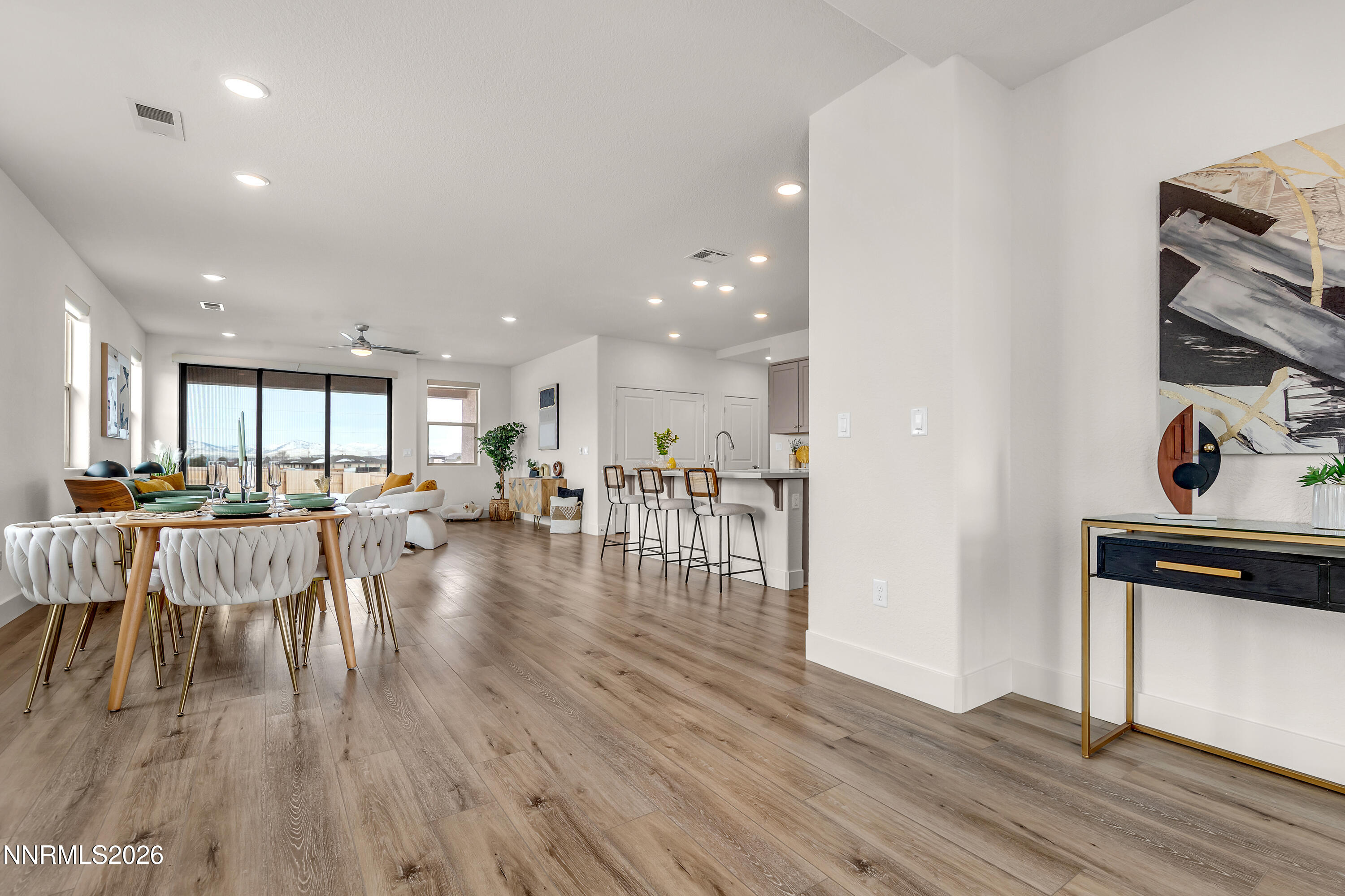 815 North Thunder Butte Court Reno, NV 89506 - Photo 10 of 35 an open kitchen with wooden floor and large windows