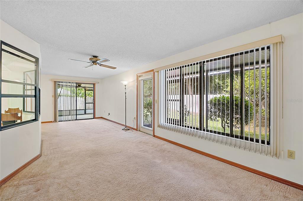 501 Cherry Tree Street Eustis, FL 32726 - Photo 15 of 35 a view of a room with windows