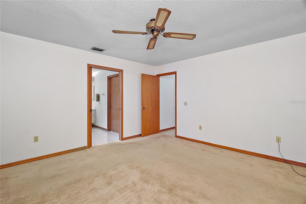 501 Cherry Tree Street Eustis, FL 32726 - Photo 17 of 35 a view of room with ceiling fan