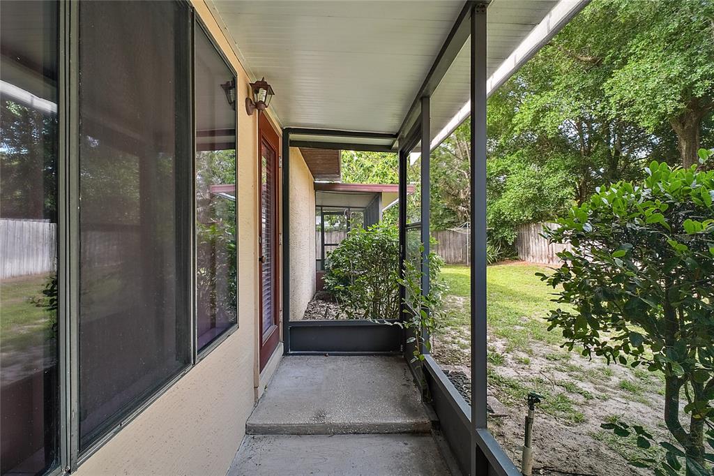 501 Cherry Tree Street Eustis, FL 32726 - Photo 26 of 35 a view of balcony and garden