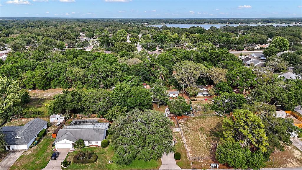 501 Cherry Tree Street Eustis, FL 32726 - Photo 32 of 35 an aerial view of a residential houses with city view