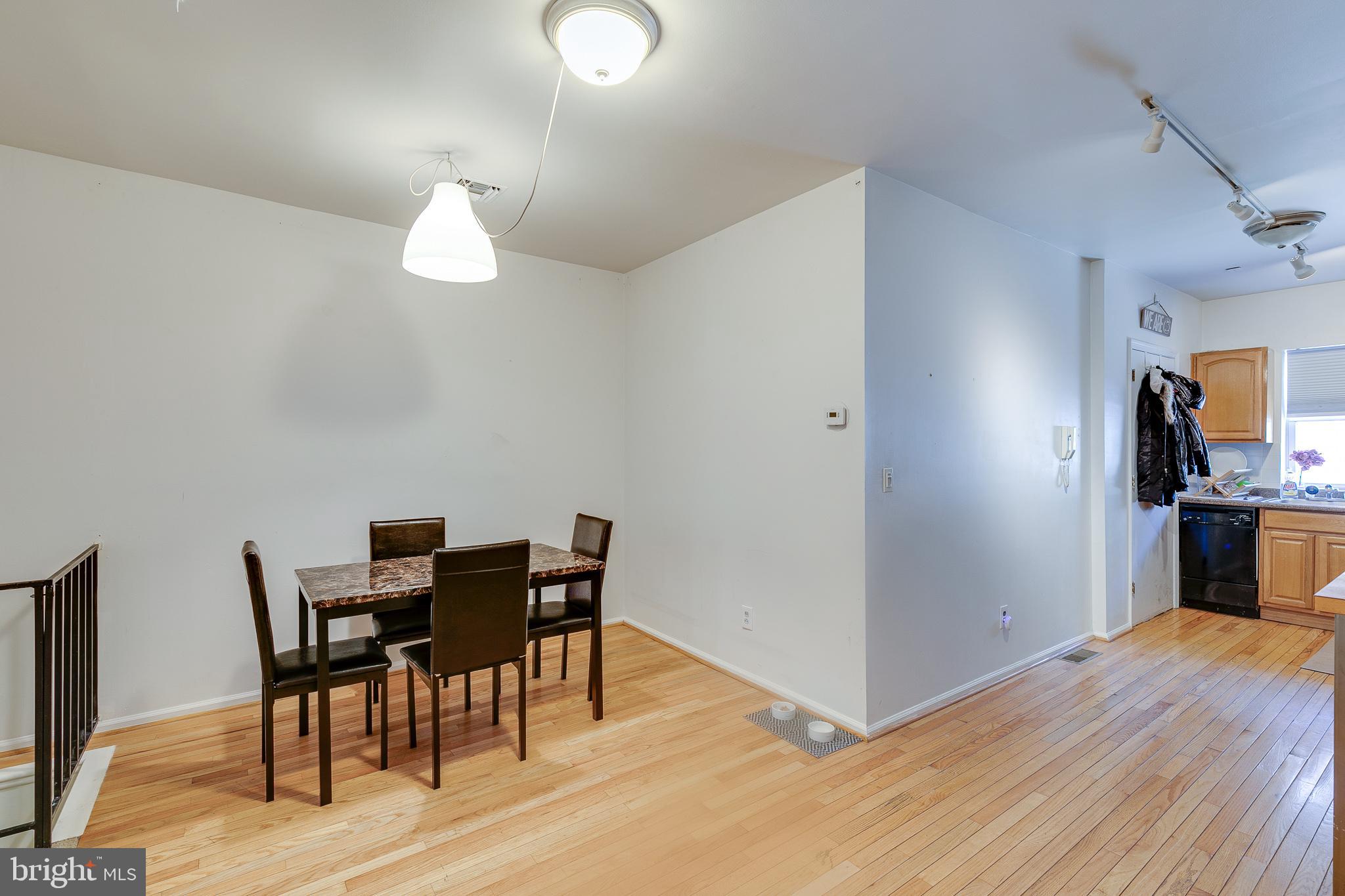 1004 Christian Street Philadelphia, PA 19147 - Photo 10 of 34 a view of a dining room with furniture and wooden floor