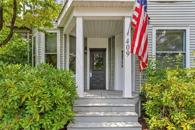 a front view of a house with a garage