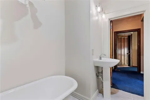 a bathroom with a sink and toilet