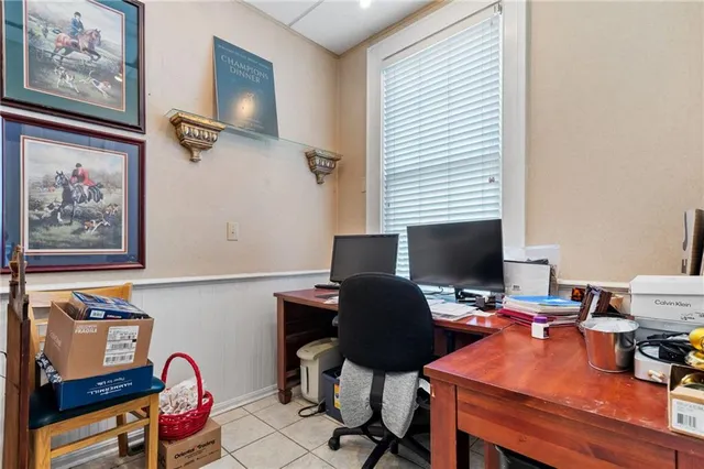 a bathroom with a sink mirror and toilet