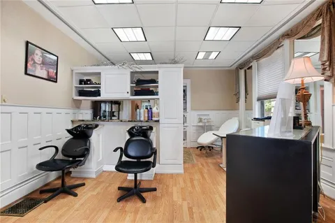 a view of a living room and bathroom