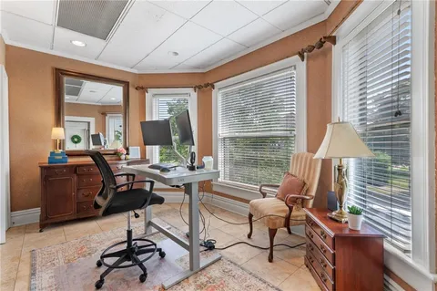 a living room with furniture or window and a table