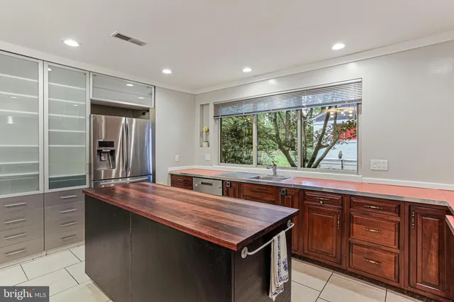 a kitchen with a stove and a sink