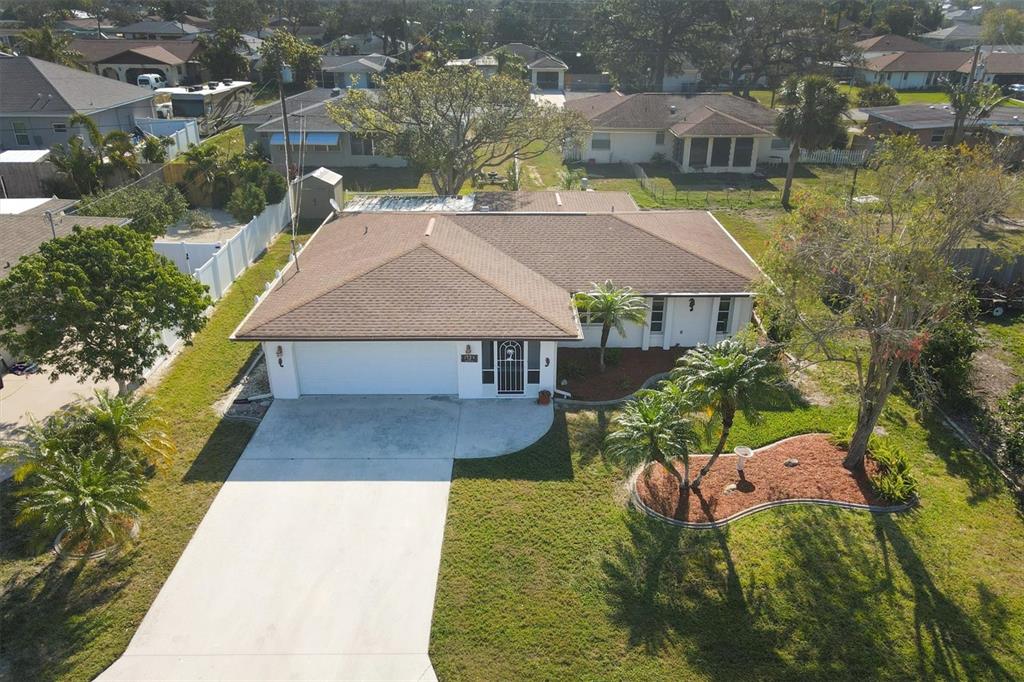 1325 Kimball Road Venice, FL 34293 - Photo 1 of 1 an aerial view of a house