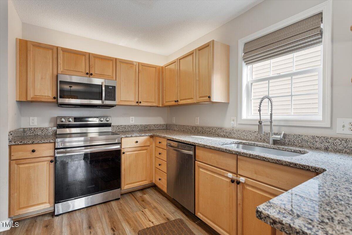 2121 Ramsgate Street Raleigh, NC 27603 - Photo 12 of 30 Kitchen with SS Appliances