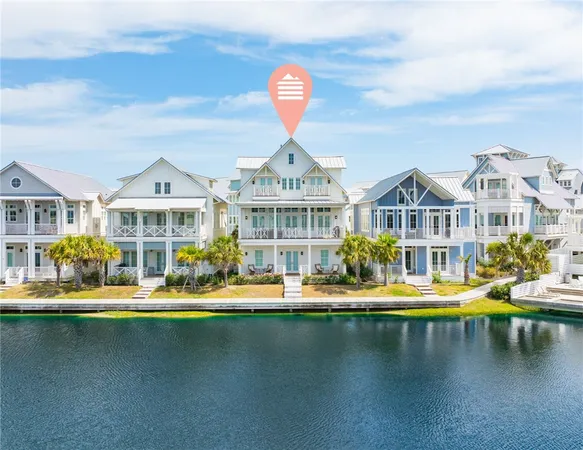 a front view of a building with lake view and boat