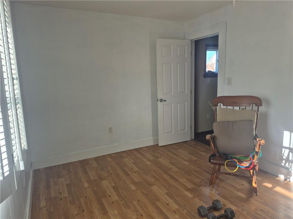 204 Ridge Avenue Derry, PA 15627 - Photo 9 of 22 a view of workspace with wooden floor and windows