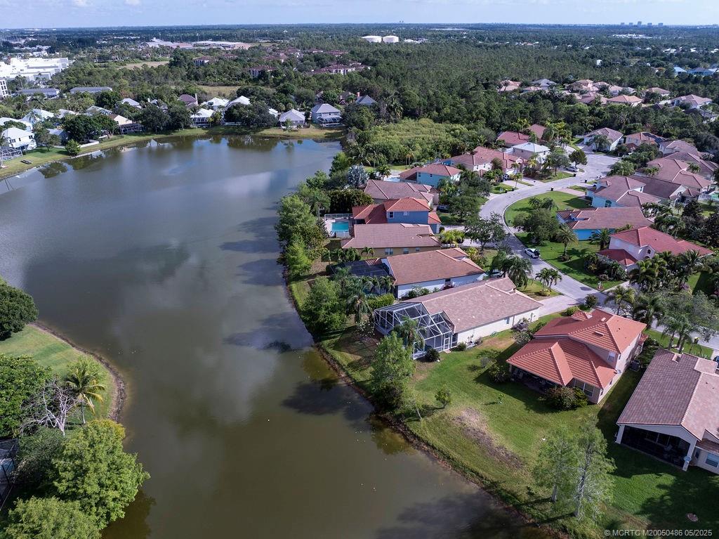 2096 Northwest Marsh Rabbit Lane Stuart, FL 34994 - Photo 11 of 58 an aerial view of residential houses with outdoor space and river