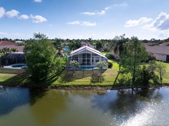a view of a swimming pool with a lake view