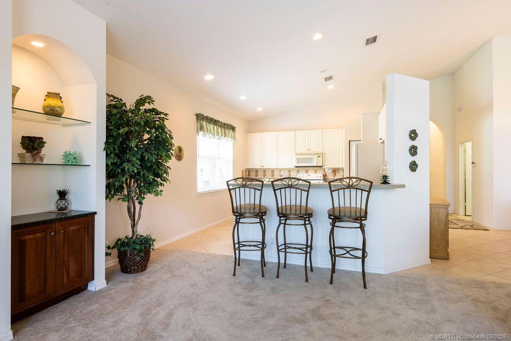 2096 Northwest Marsh Rabbit Lane Stuart, FL 34994 - Photo 39 of 58 a view of a livingroom with furniture and entryway